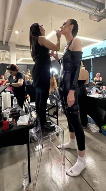doing makeup of a tall model