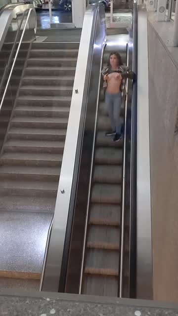caught with my tits out on the escalator