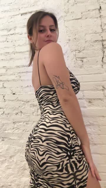 what's beneath from the back of this dress is tempting