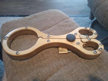 20 pieces of laser cut, hand sanded, well-lacquered birch wood custom fit fiddle with a walnut locking pin.