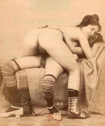 two victorian girls playing together
