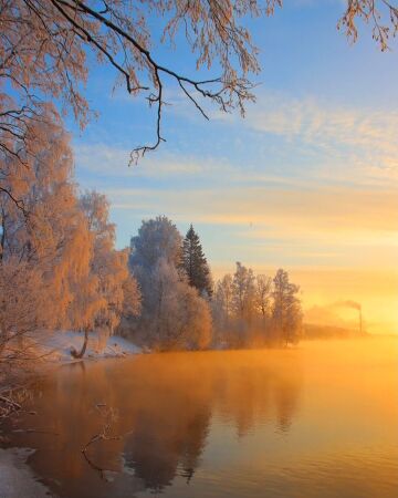 sunrise over a river of gold, finland.
