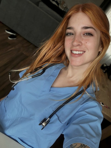 all you need is a pretty redhead nurse in your life