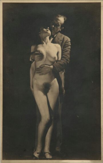 french surrealist poet paul Éluard hugging a naked woman in his arms, 1947