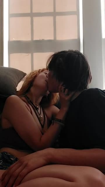 cute teen couple kissing softly