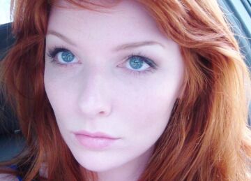 blue eyed redhead beauty