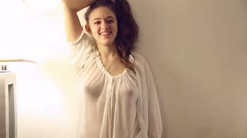 perky boobs and a cute smile