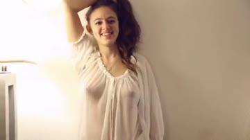 perky boobs and a cute smile