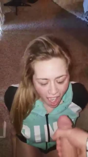 college girl on her knees taking a huge one