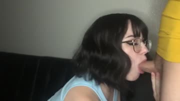 cute girl with glasses gives blowjob