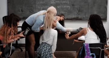 lesbian milf teacher dominating two students in front of the class
