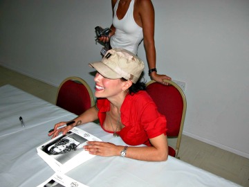 alyssa milano supports the troops...the table supports her breast