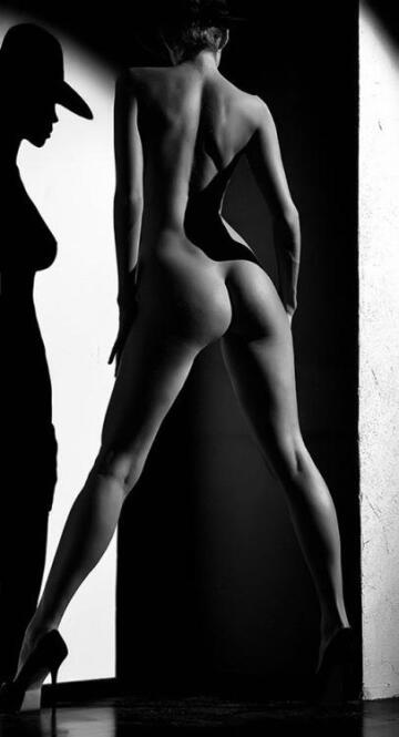 naked on high heels with a hat is all it needs to be erotic....