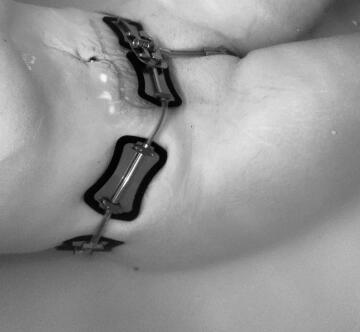plugged and belted in the bath