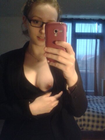 keeping the glasses on while flashing you a nip slip ;)