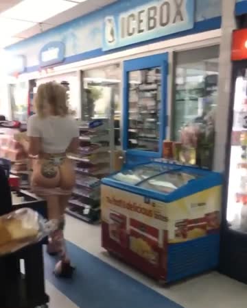 hot blonde getting naughty in the gas station!
