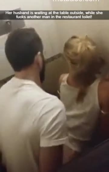 her husband is outside paying the bill