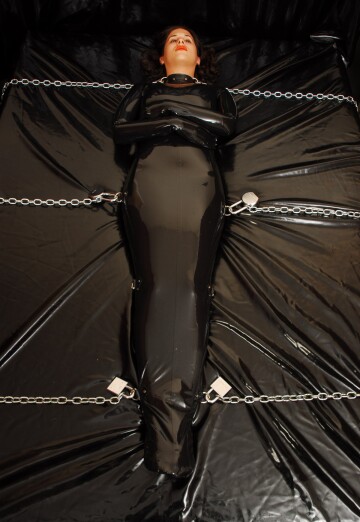 marina - latex sleepsack, chained to bed