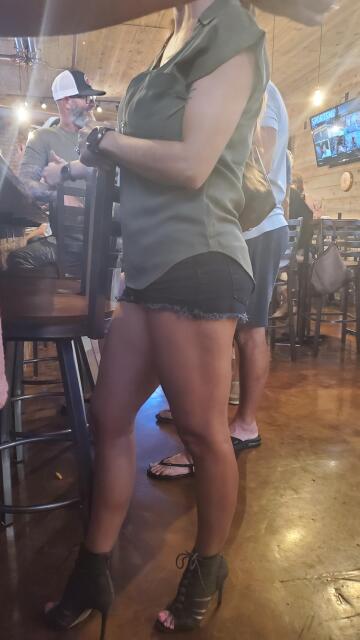 i wear short shorts and heels because i know how much my husband loves it. the fact that he took a picture of me while i was ordering a drink is proof that he does.
