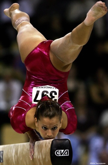 alicia sacramone on the balance beam at the 2006 artistic gymnastics world championships