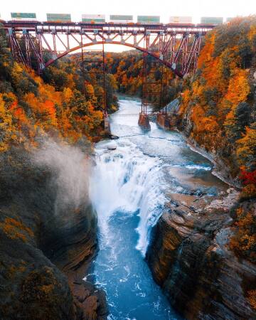 genesee arch bridge over the genesee river gorge in letchworth state park during fall, livingston county and wyoming county, new york.