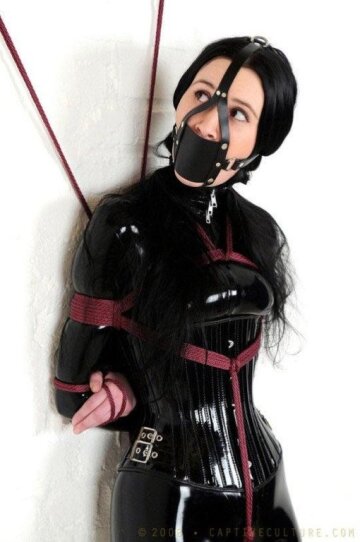 amelie - black catsuit, corset, harness/crotch-tie and muzzle gag
