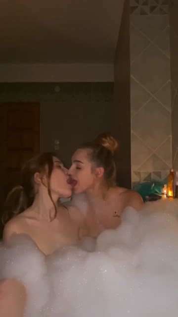 2 girls in a bubble bath