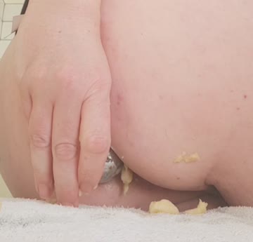 my ass finally accepts that the banana is staying in. plugged, and panties back up, i continued with my work.....