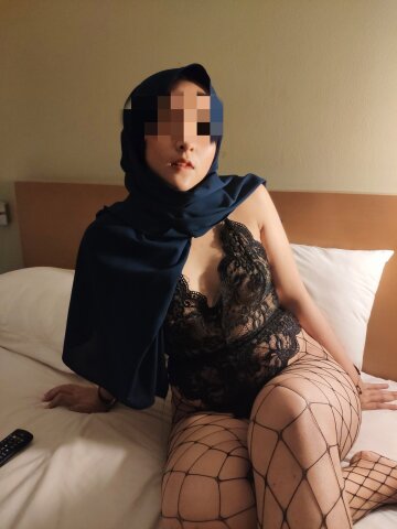 indonesian hijabslut in lingerie and fishnets.