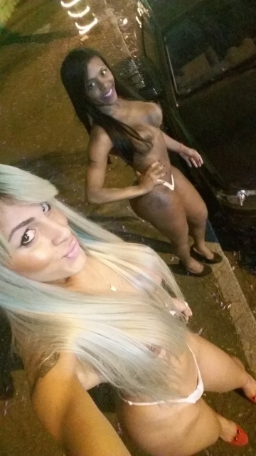 two girls out on the street (no visible cock)