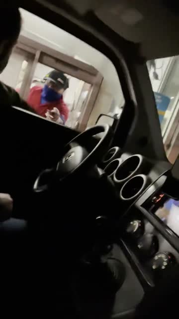 we made a special trip through the drive through last night. when he finally noticed he almost dropped out bag of food!!! [f]