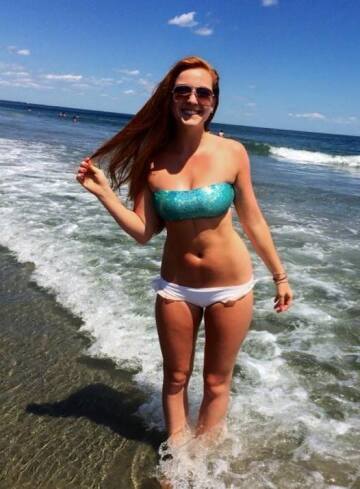 redhead at the beach