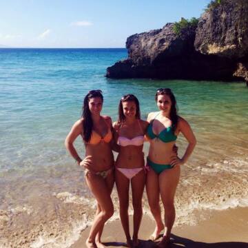 three brunettes at the beach