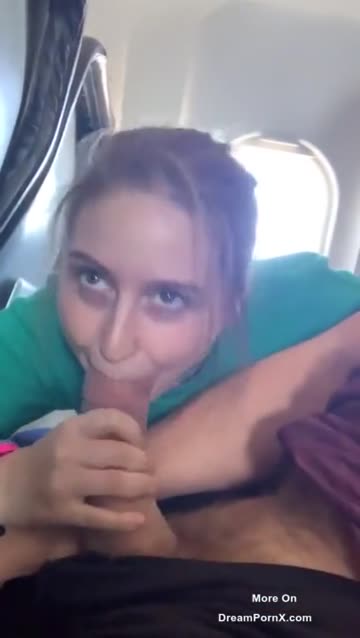 pretty teen sucks a big cock on a public plane in front of everybody