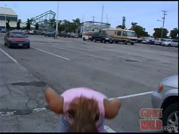embarrassed hottie flashing at the amusement park!