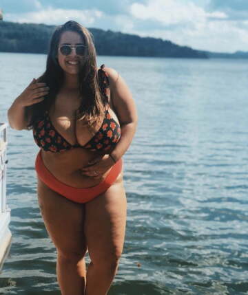 huge melons stuffed into her bikini top