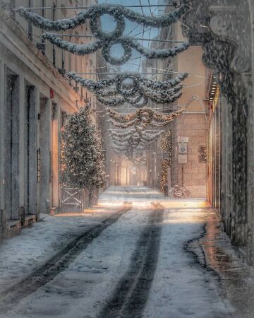 empty street in the snow, milan, italy.