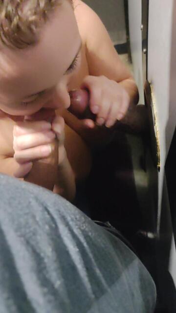 sucking cock at the gloryhole