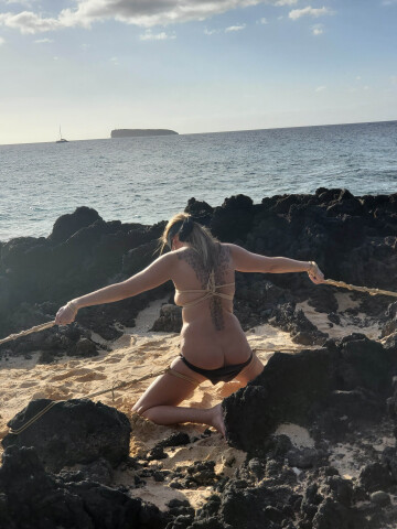 my wife's girlfriend i tied on little beach in maui (back view)