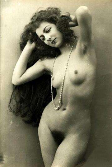 vintage nude with long hair and pearls