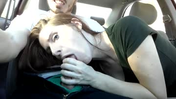 blowjob from a redhead in the driver's seat