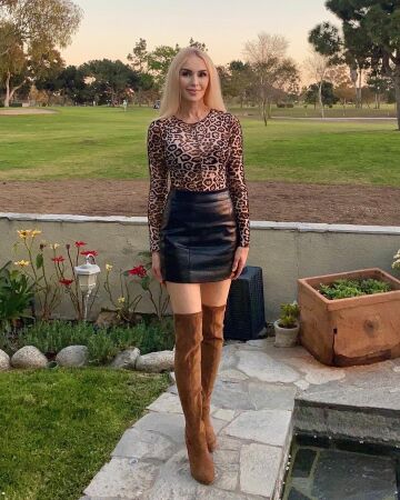 stunning hot blonde milf in mini skirt and long boots