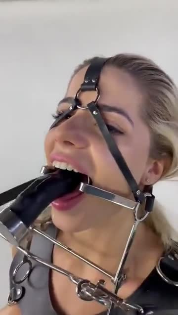 deepthroating with a metal gag [xpost /r/gagged]