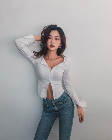 in jeans and double zipper shirt