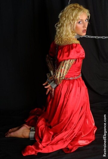 medieval woman chained up and on her knees