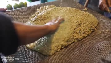 how traditional olive oil is made (crushed on a stone mill then pressed)