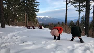 friends peeing in the snow