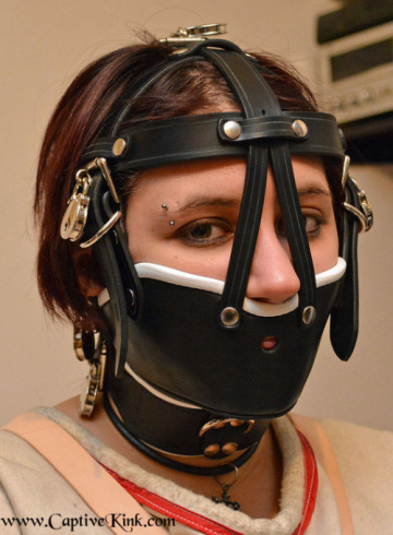 straitjacketed and muzzled
