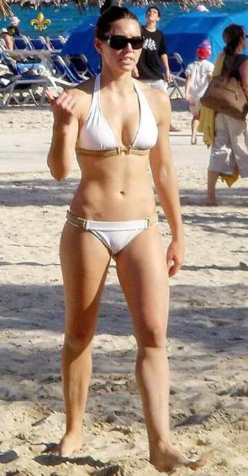 jessica biel in a white bikini showing off her hot belly button