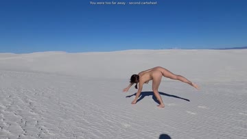 cartwheels in white sand
